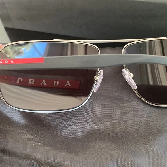 Prada sunglasses with the glasses bag and box